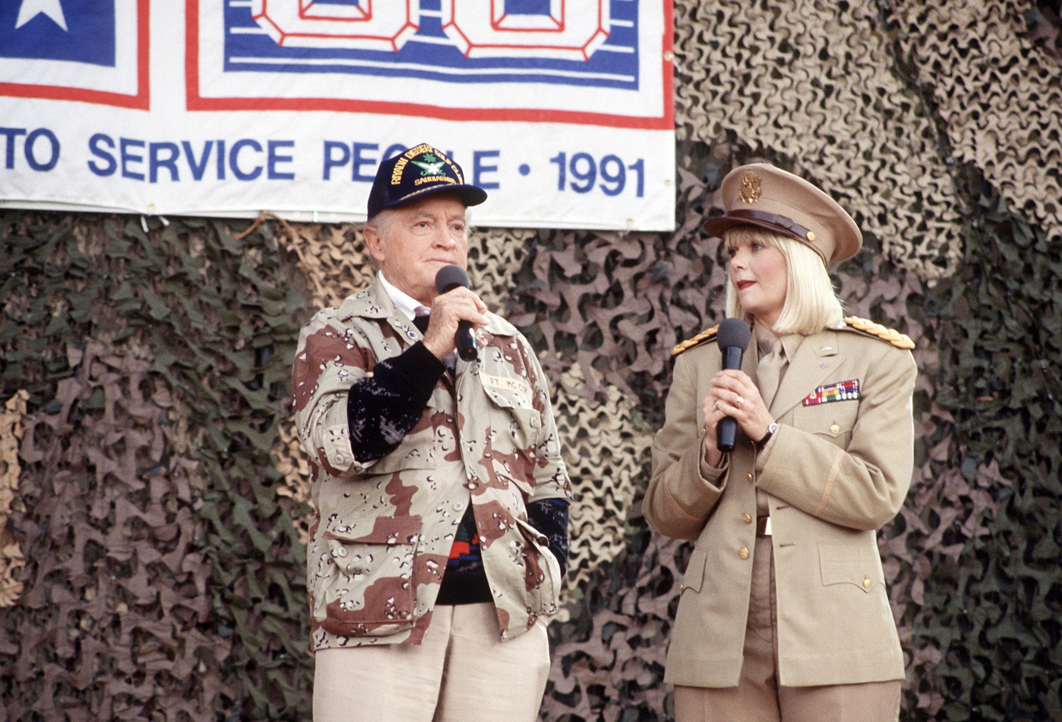 Hope and actress Ann Jillian perform in the USO Christmas Tour during Operation Desert Shield. 